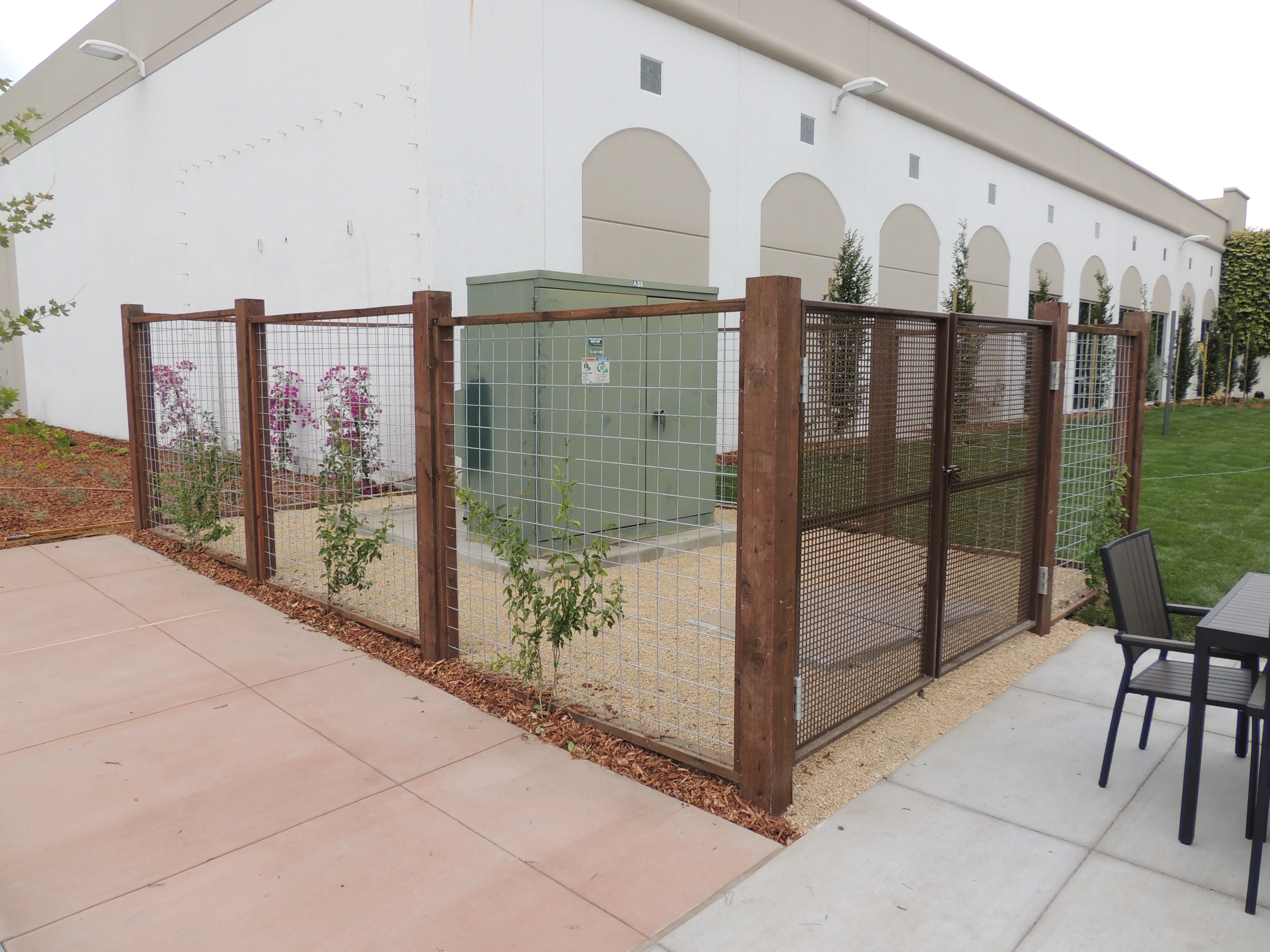 Corporate-campus fence line and gate installed by Pacific Security Fence